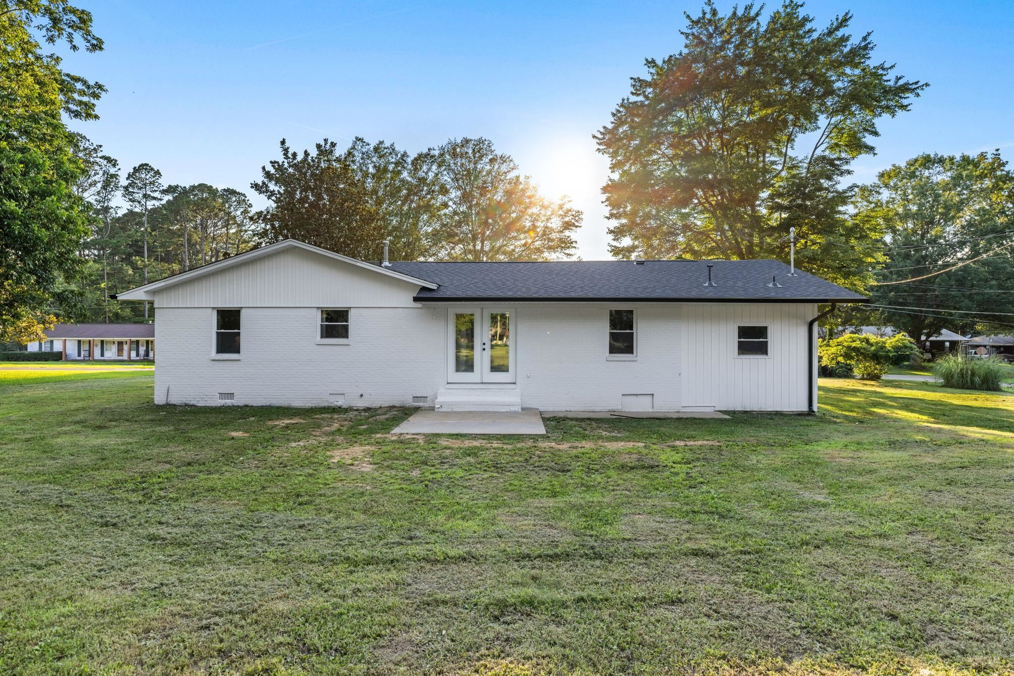 17 County Road 233 Corinth, MS 38834 - Photo 23 of 40 Rear view of house featuring french doors and a yard