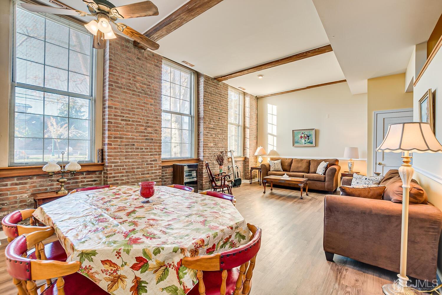 40 Washington Avenue, Unit 9 Milltown, NJ 08850 - Photo 21 of 43 a bed room with a bed and a couch