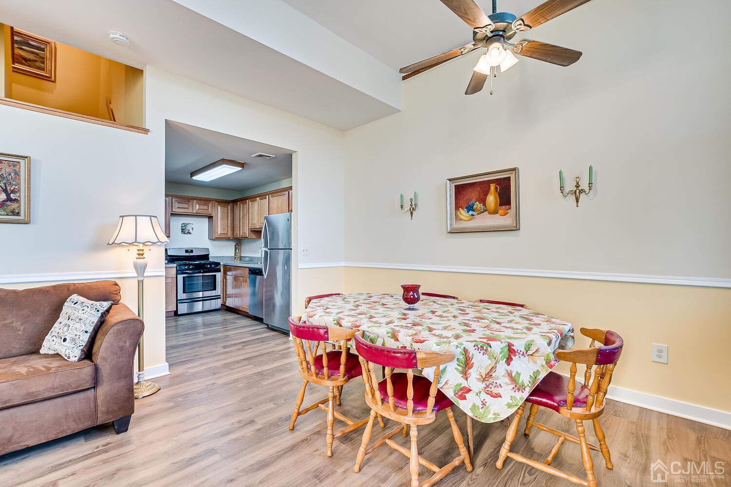 40 Washington Avenue, Unit 9 Milltown, NJ 08850 - Photo 23 of 43 a living room with furniture and a wooden floor