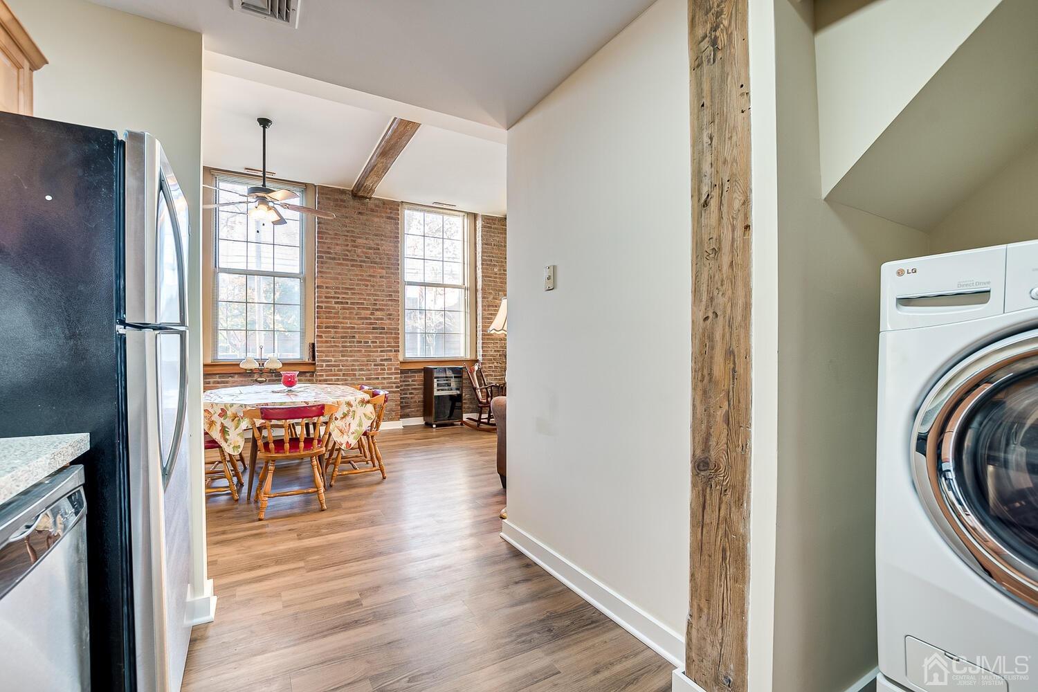 40 Washington Avenue, Unit 9 Milltown, NJ 08850 - Photo 26 of 43 a view of a hallway with furniture and wooden floor