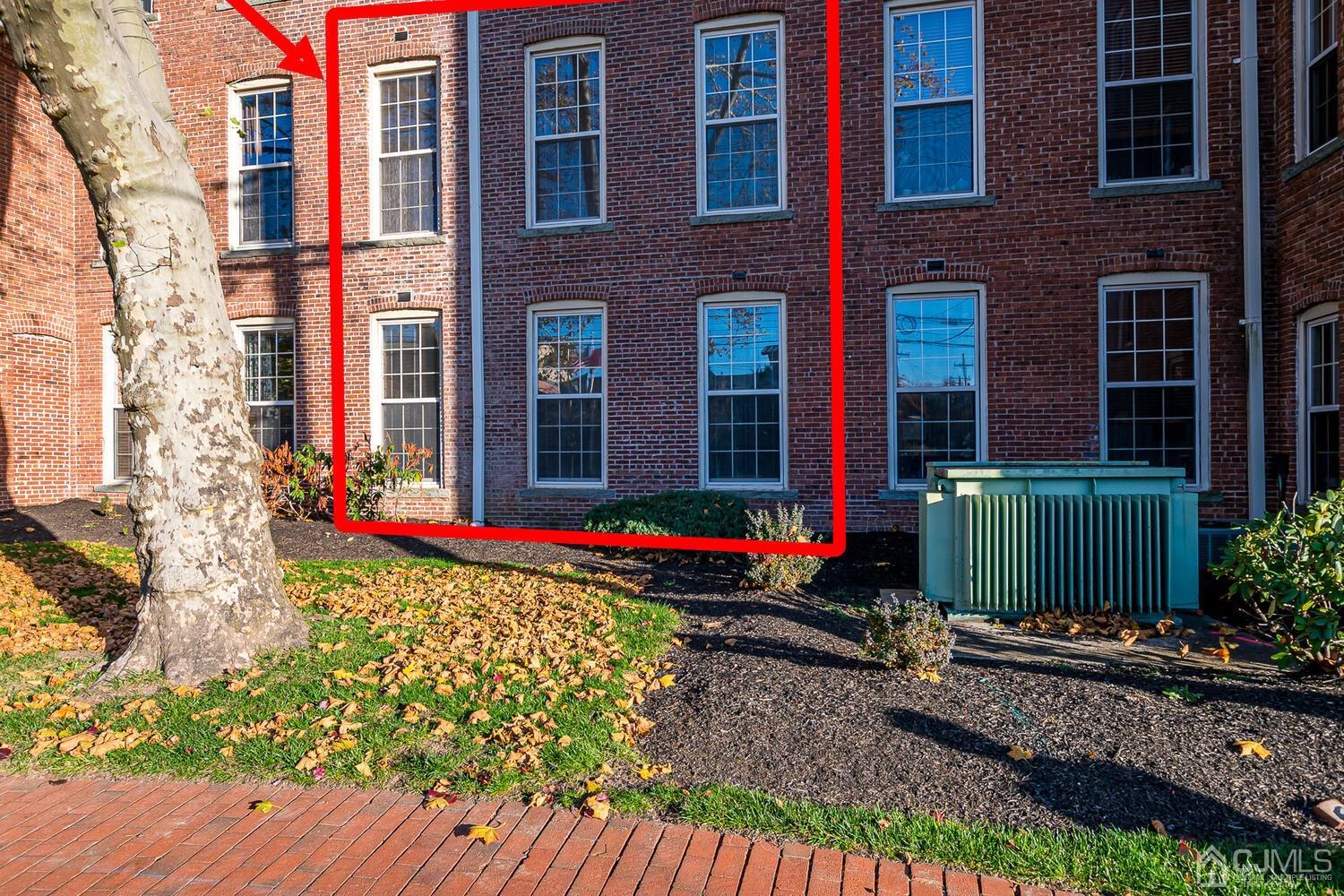 40 Washington Avenue, Unit 9 Milltown, NJ 08850 - Photo 7 of 43 a view of a house with a yard and garden