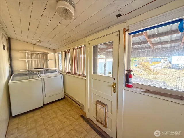 a utility room with dryer and washer