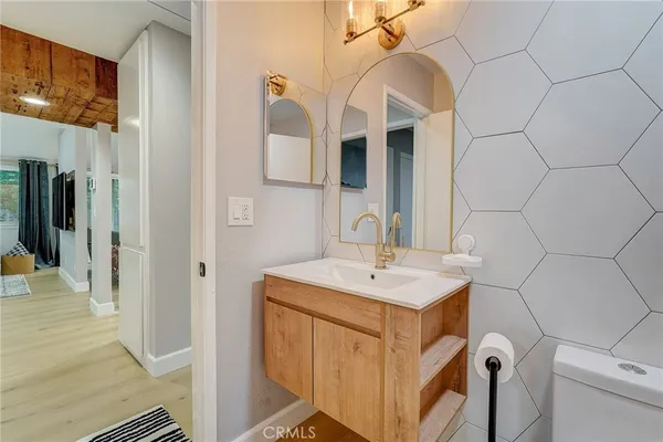 a bedroom with a bed and a table