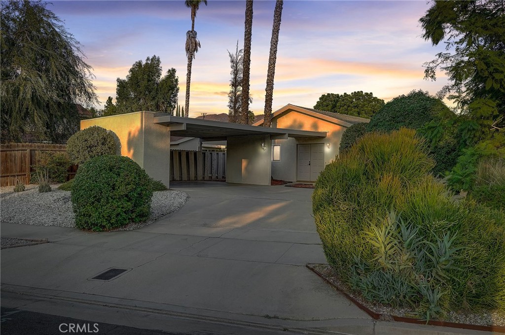 5030 Kensington Way Riverside, CA 92507 - Photo 2 of 18 a view of a house with a yard