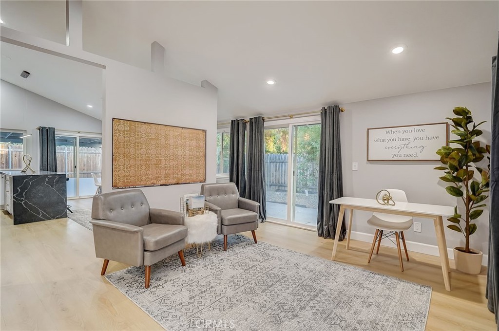 5030 Kensington Way Riverside, CA 92507 - Photo 8 of 18 a living room with furniture and a large window