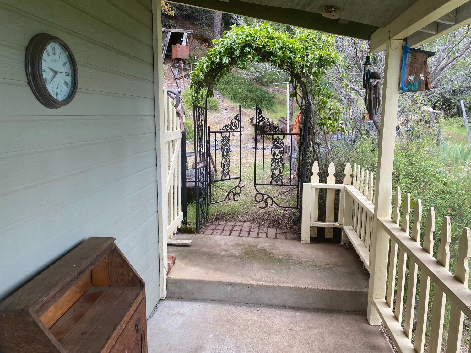 5021 Banbury Cross Road Shingle Springs, CA 95682 - Photo 6 of 92 Side porch with view towards the backyard.
