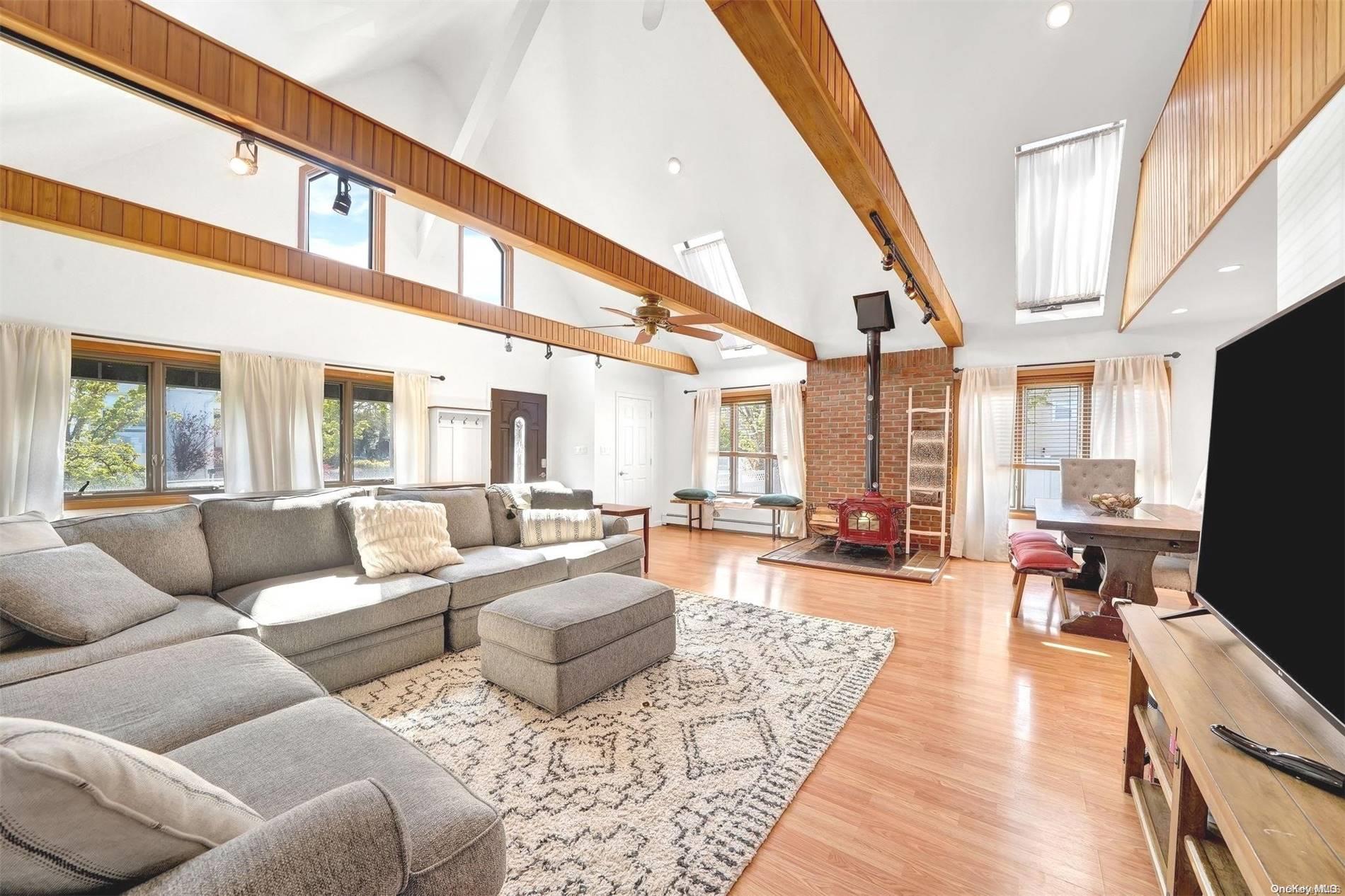 Living Room with 22ft vaulted ceilings
