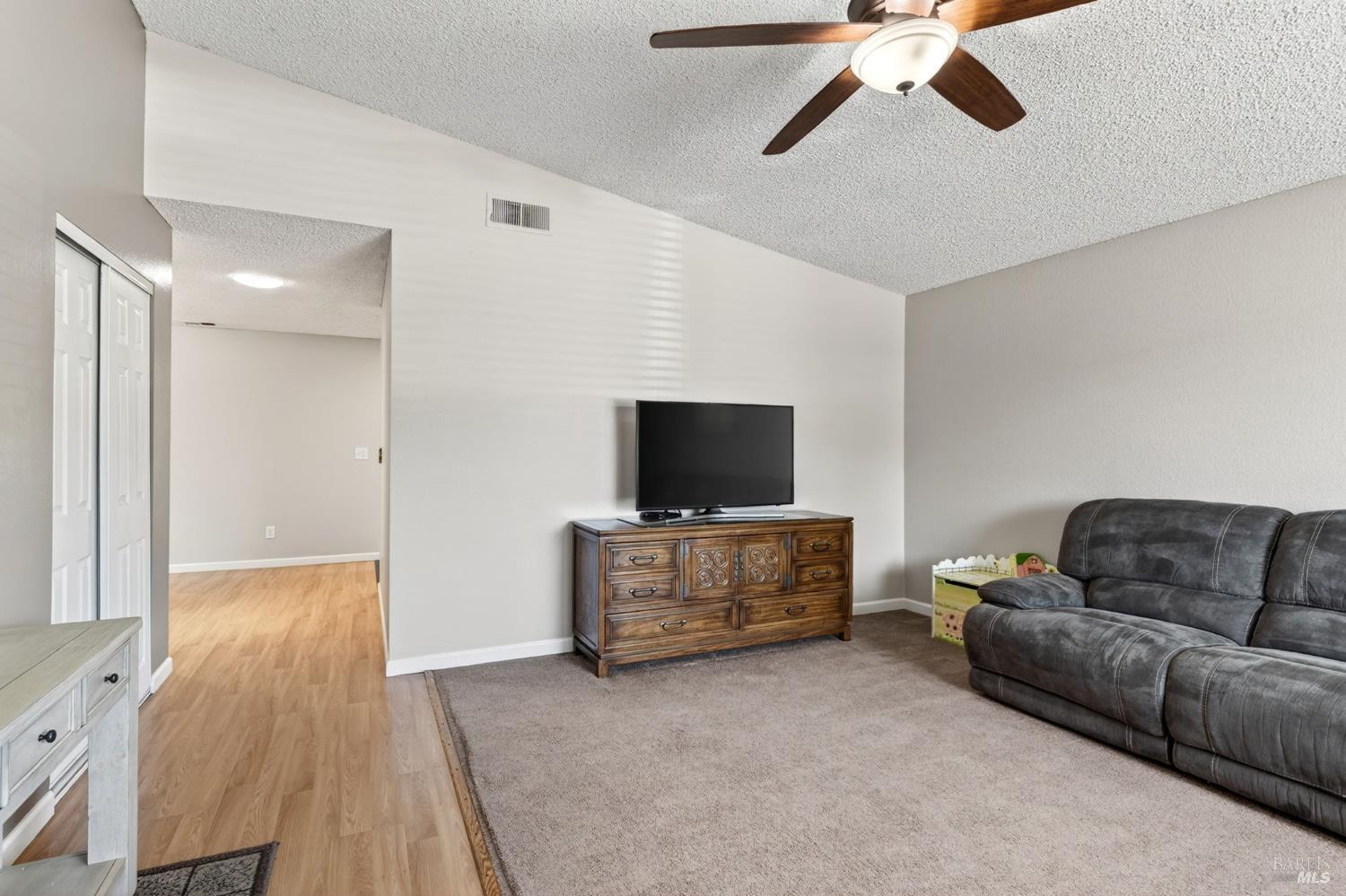 4526 Hillview Court Rohnert Park, CA 94928 - Photo 5 of 28 a living room with furniture and a flat screen tv