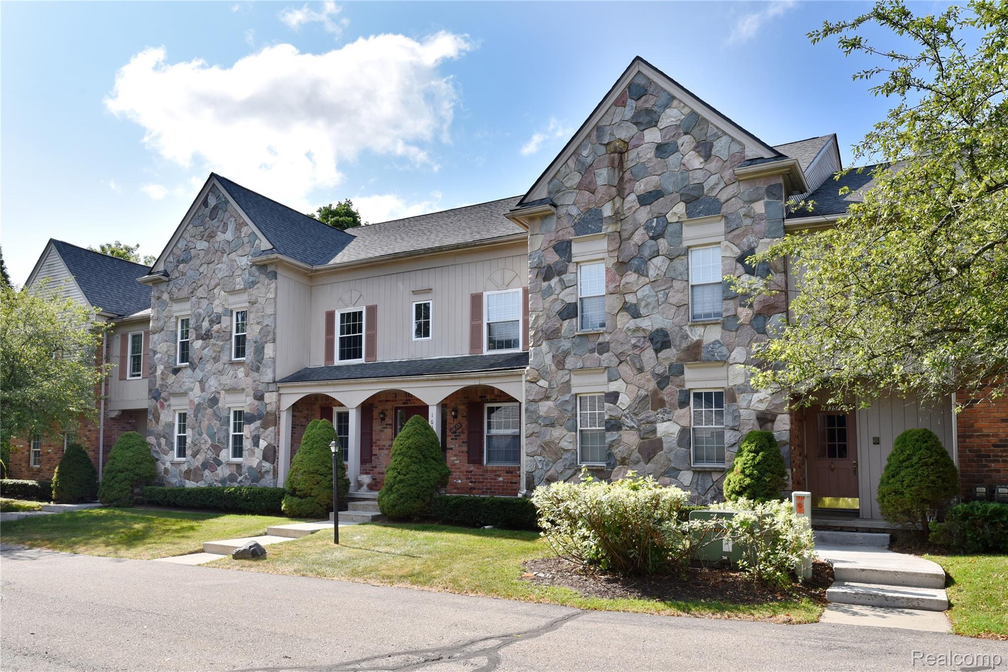 1635 Huntington Park, Unit A Rochester, MI 48309 - Photo 1 of 41 Front of Building