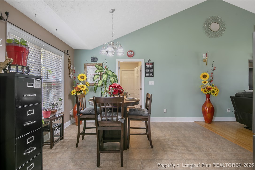 245 Apple Tree Circle Raeford, NC 28376 - Photo 12 of 41 a view of a dining room with furniture