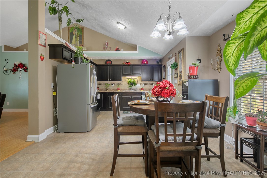 245 Apple Tree Circle Raeford, NC 28376 - Photo 13 of 41 a dining room with furniture and window