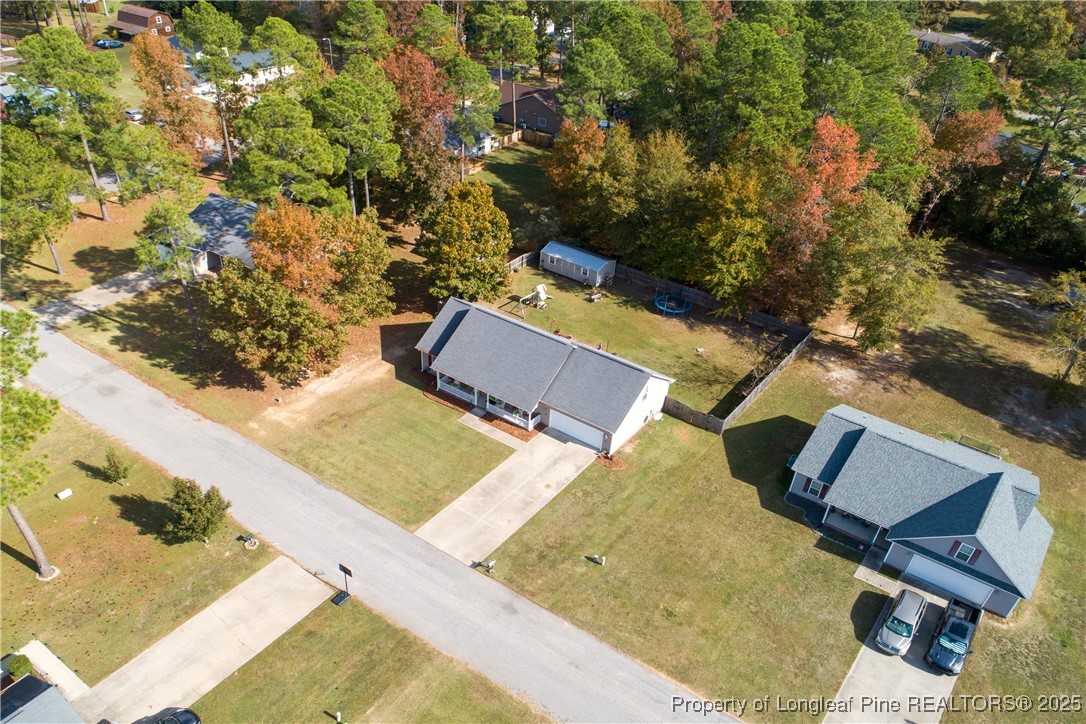245 Apple Tree Circle Raeford, NC 28376 - Photo 37 of 41 an aerial view of a house with swimming pool and sitting space