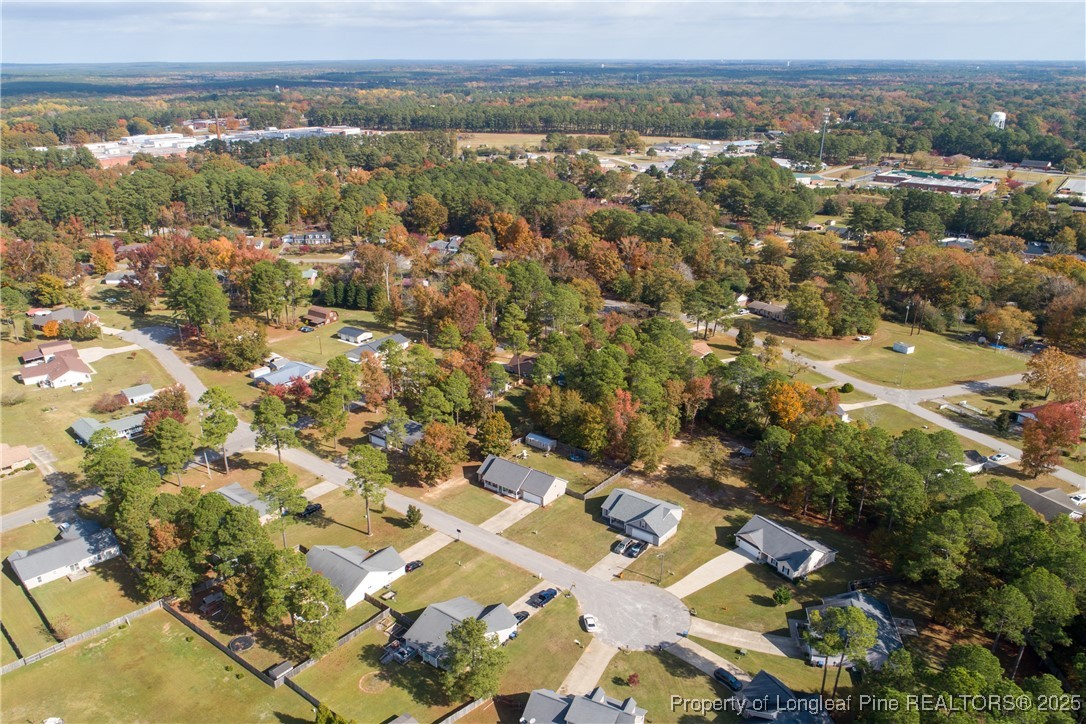 245 Apple Tree Circle Raeford, NC 28376 - Photo 39 of 41 an aerial view of residential house with yard and mountain view in back