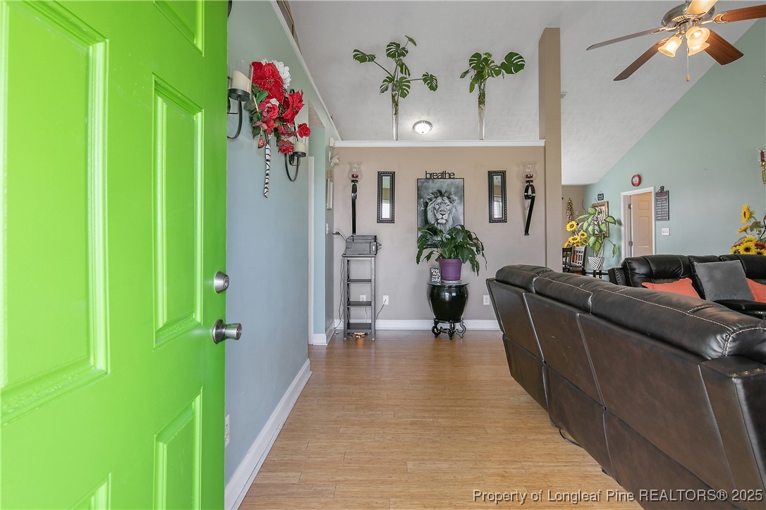 245 Apple Tree Circle Raeford, NC 28376 - Photo 6 of 41 a living room with furniture and a yard