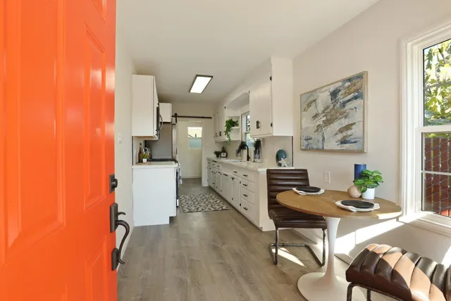 a workspace with furniture and window