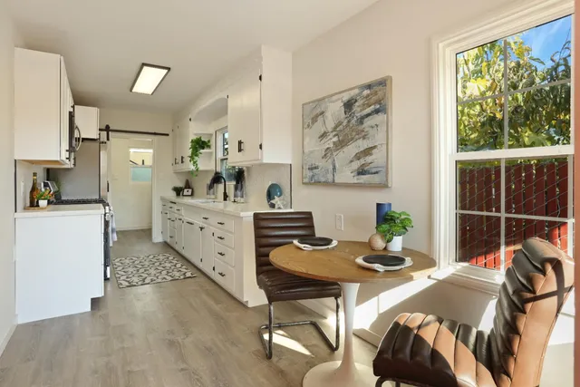 a bed room with a bed furniture and a window