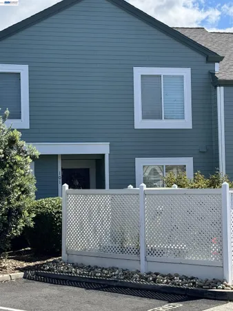a front view of a house with a garage