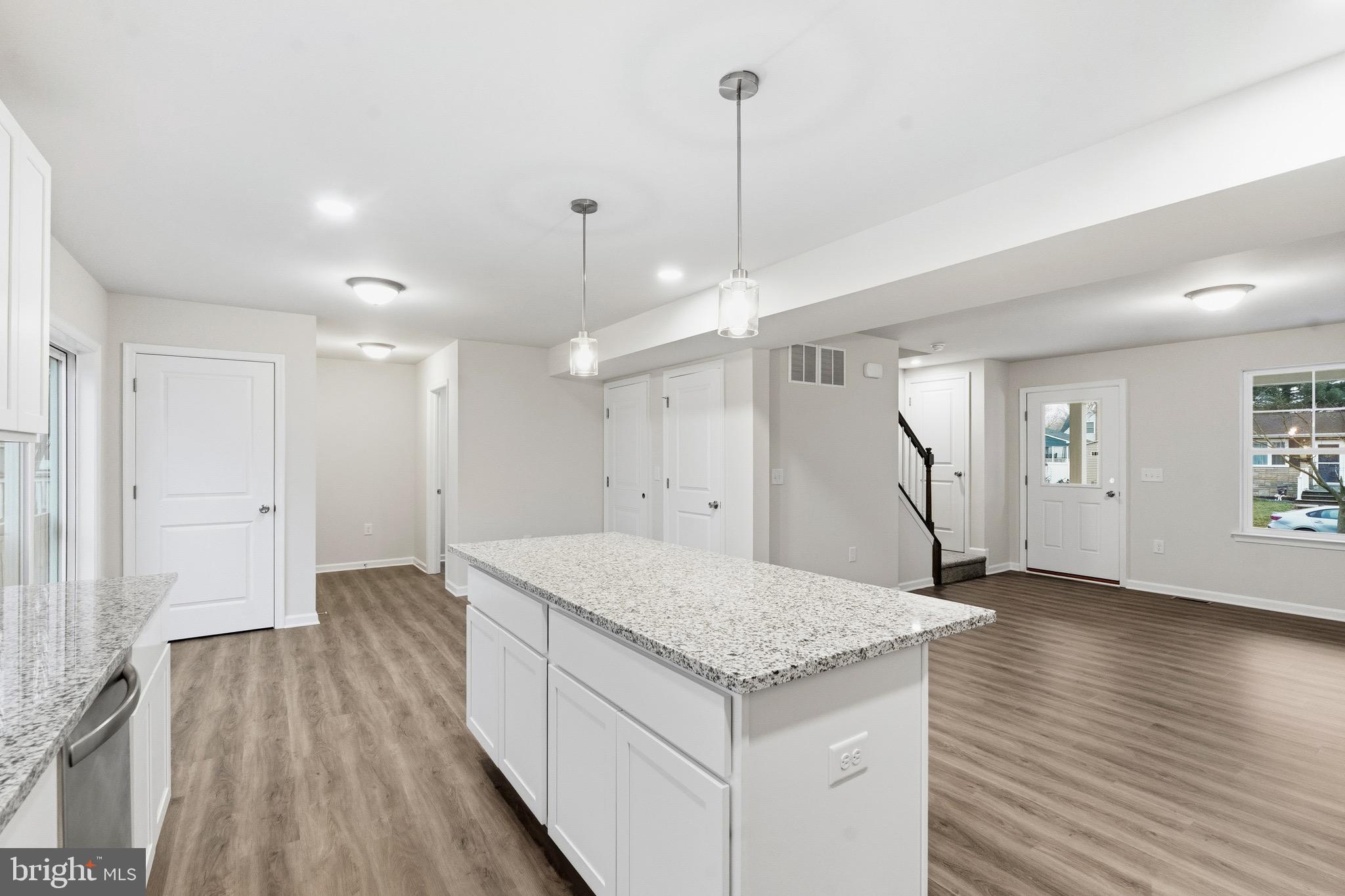 105 West Washington Avenue Magnolia, NJ 08049 - Photo 11 of 31 a view of an empty room and wooden floor