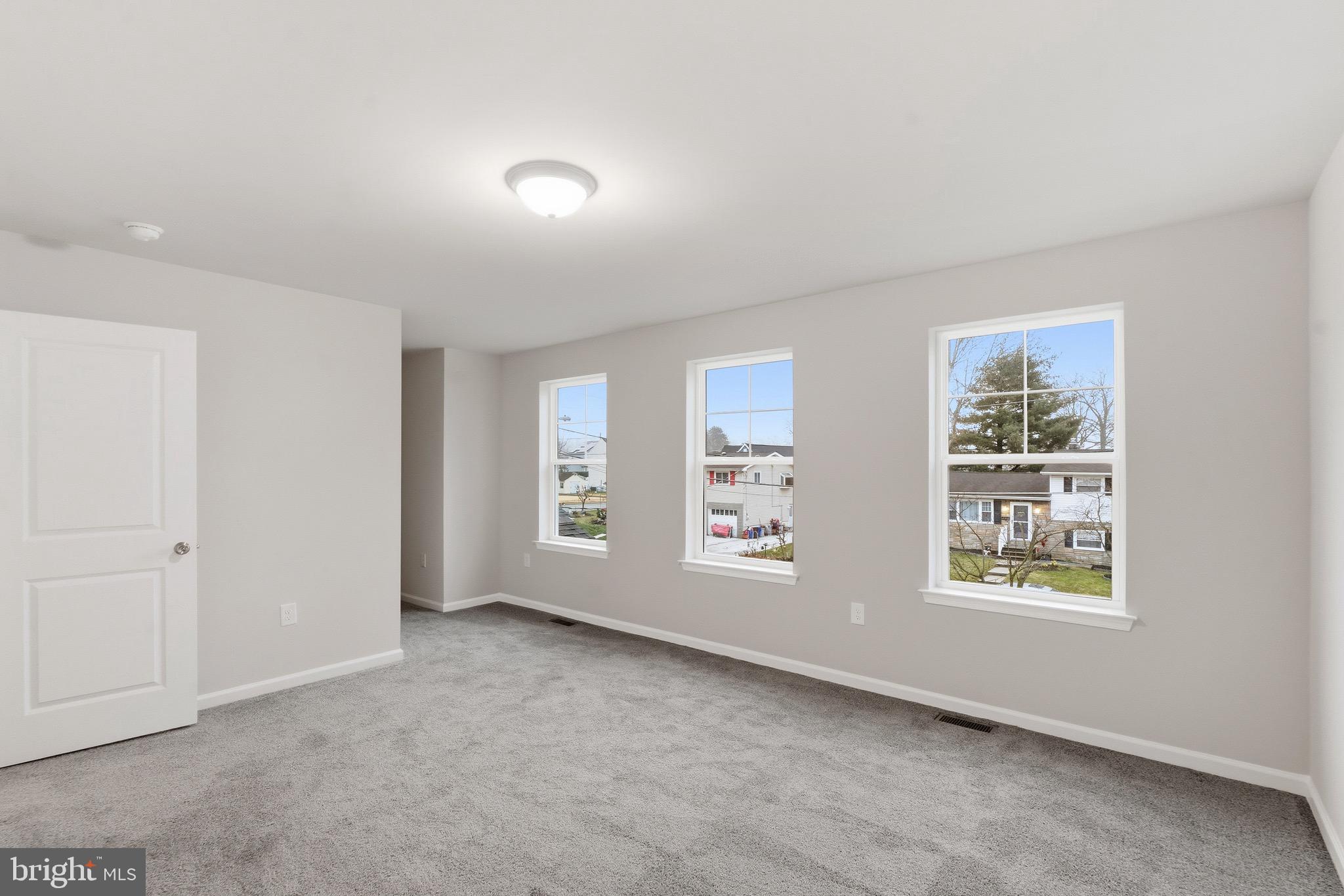 105 West Washington Avenue Magnolia, NJ 08049 - Photo 17 of 28 a view of an empty room with a window