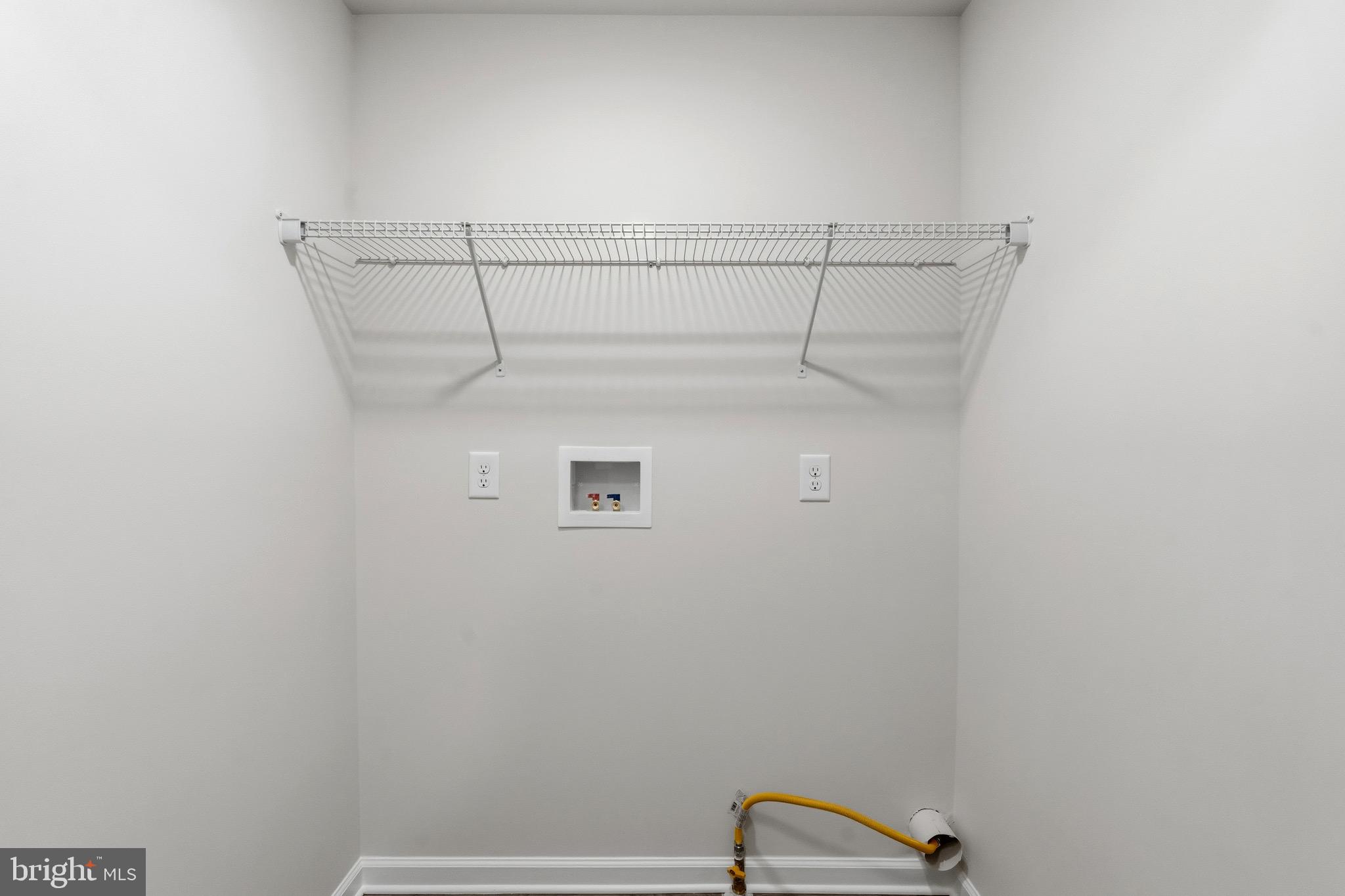 105 West Washington Avenue Magnolia, NJ 08049 - Photo 17 of 31 a view of a room with racks on the wall