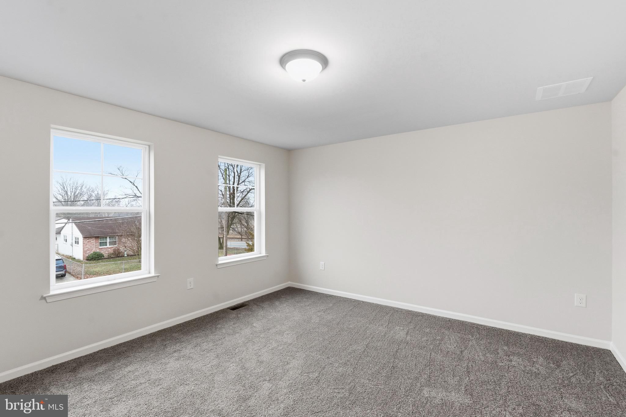 105 West Washington Avenue Magnolia, NJ 08049 - Photo 21 of 31 an empty room with windows