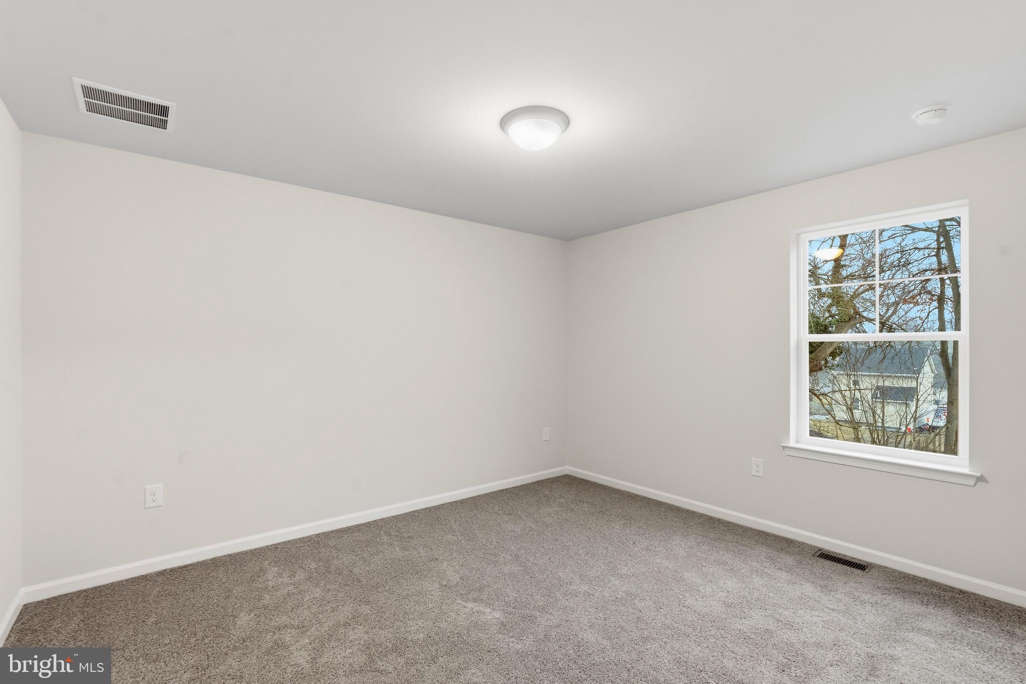 105 West Washington Avenue Magnolia, NJ 08049 - Photo 22 of 28 an empty room with a window