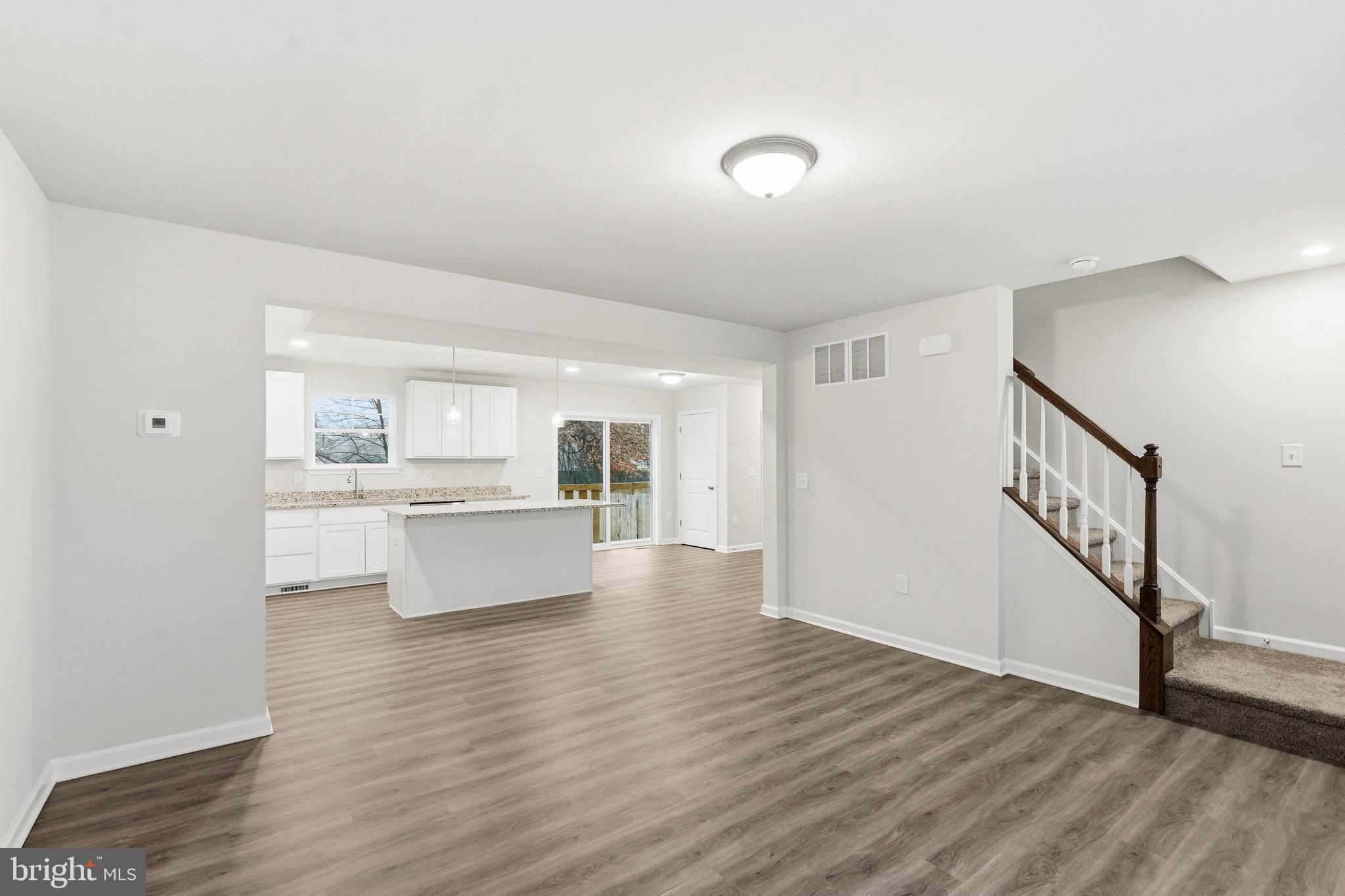 105 West Washington Avenue Magnolia, NJ 08049 - Photo 5 of 31 a view of kitchen with wooden floor and electronic appliances