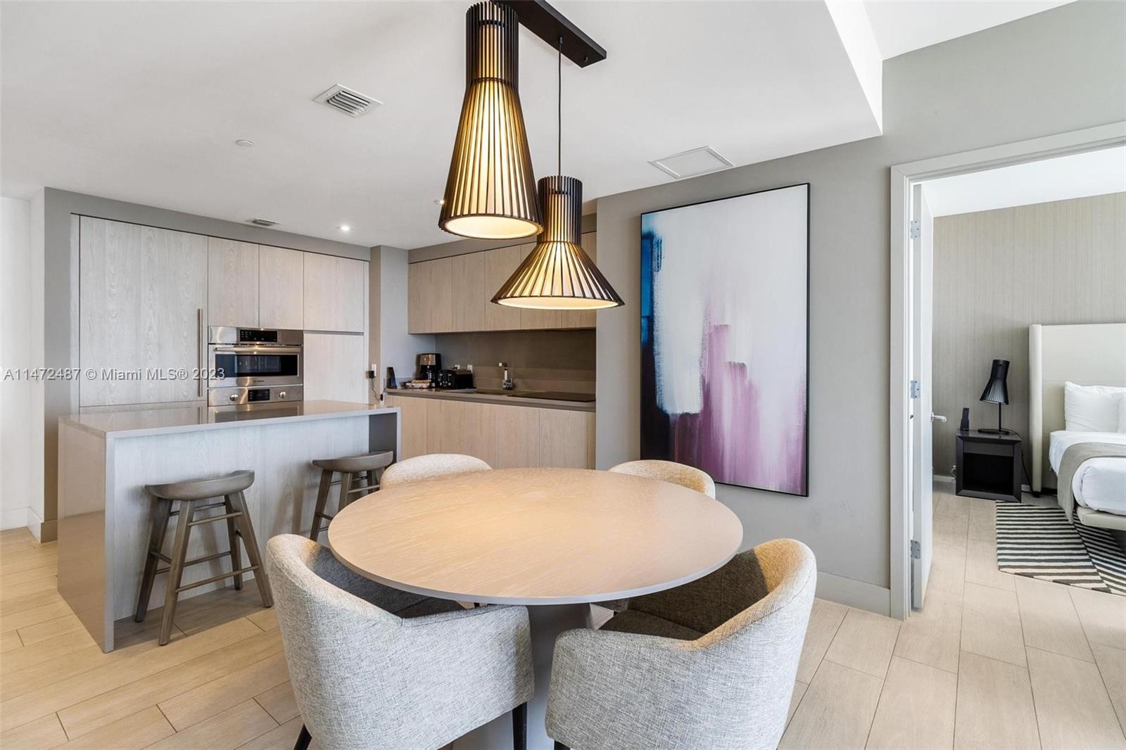 4010 South Ocean Drive, Unit R1107 Hollywood, FL 33019 - Photo 5 of 25 a view of a dining room with furniture