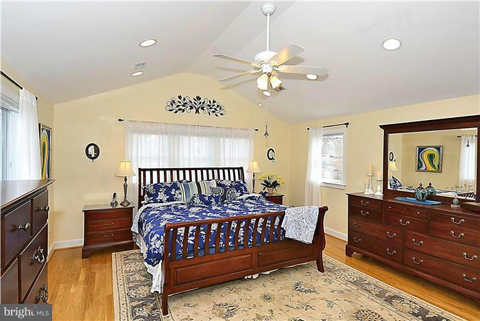 10017 Portland Road Silver Spring, MD 20901 - Photo 15 of 30 a bedroom with a bed and a dresser