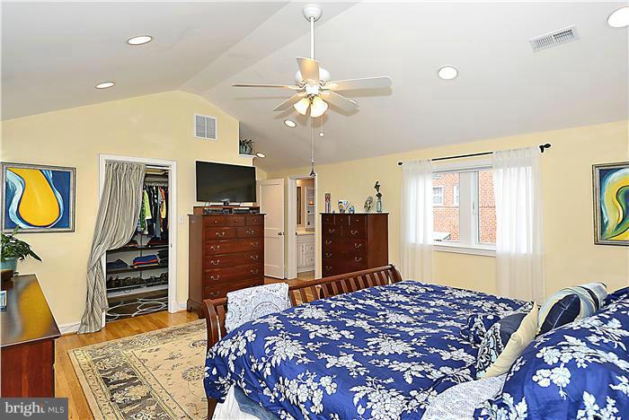 10017 Portland Road Silver Spring, MD 20901 - Photo 17 of 30 a bedroom with a bed dresser and a window