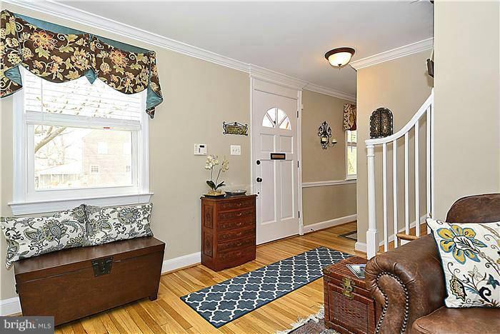 10017 Portland Road Silver Spring, MD 20901 - Photo 3 of 30 a living room with furniture and wooden floor