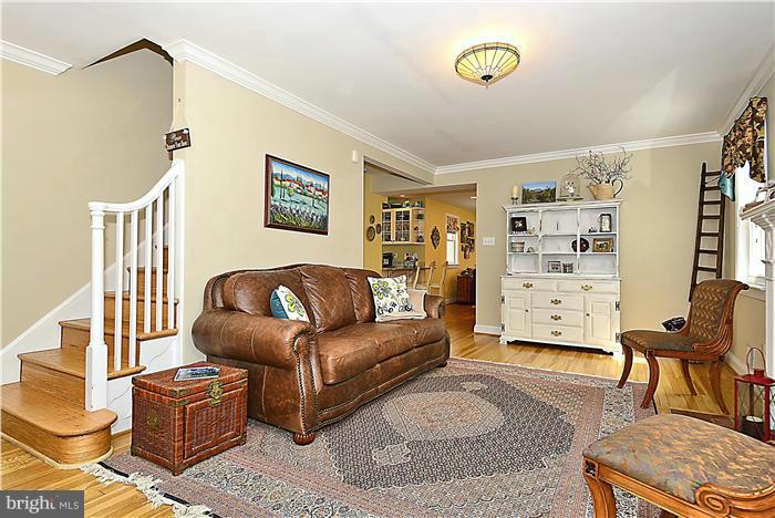 10017 Portland Road Silver Spring, MD 20901 - Photo 5 of 30 a living room with furniture and a window