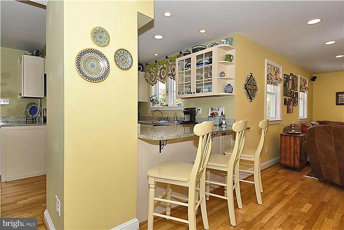 10017 Portland Road Silver Spring, MD 20901 - Photo 6 of 30 a view of a room with dining table and chairs