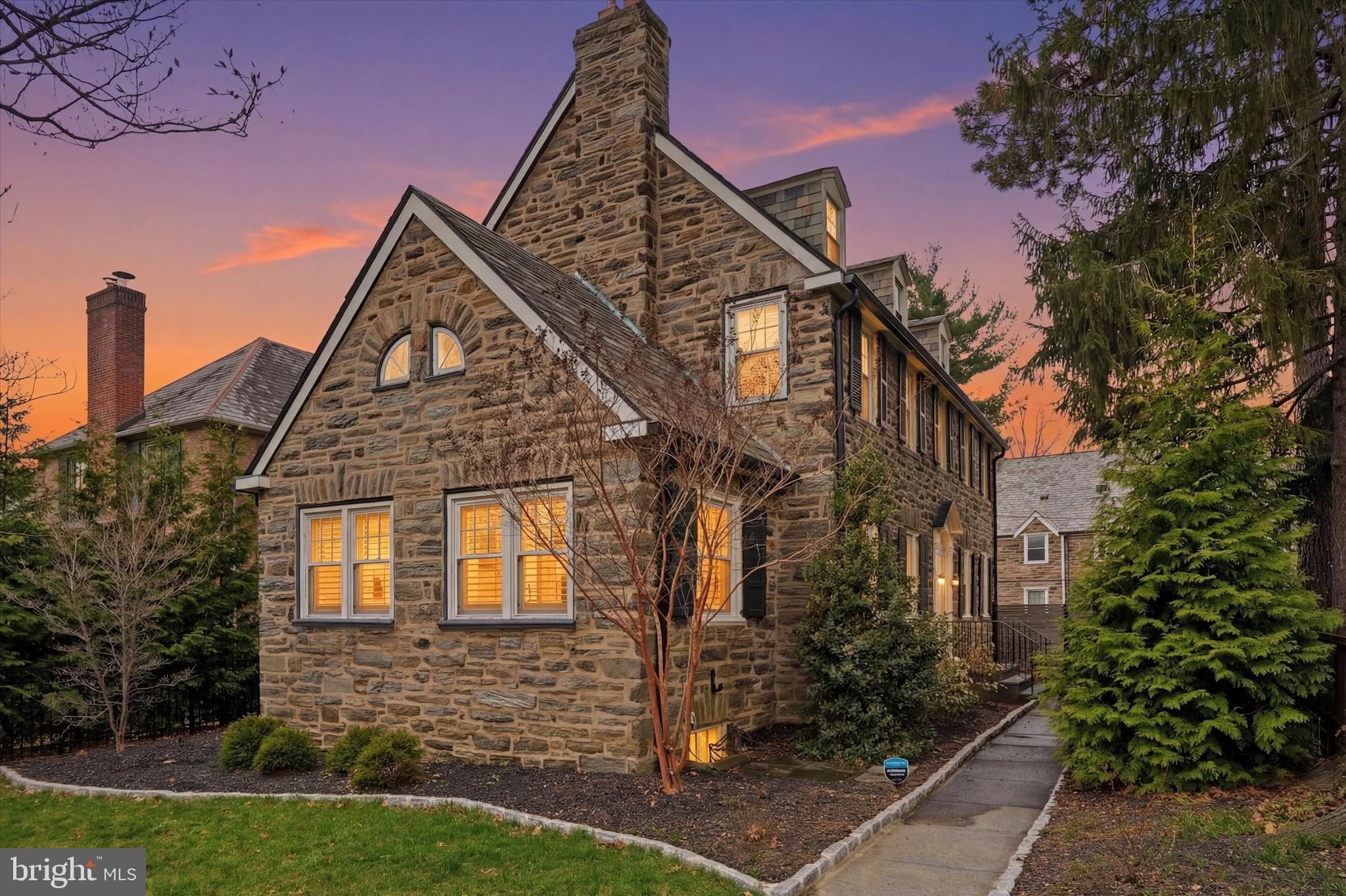 507 Murdoch Road Philadelphia, PA 19119 - Photo 2 of 52 front view of a house with a yard