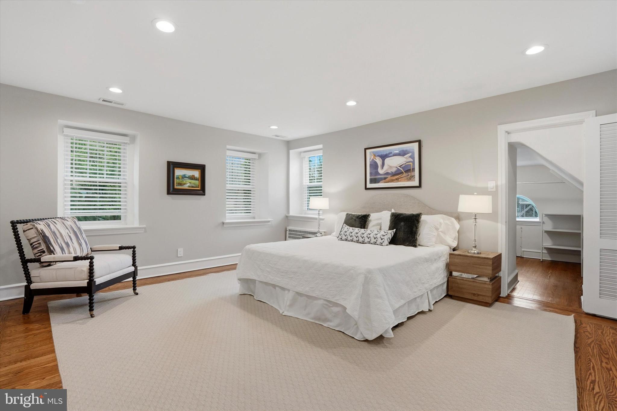 507 Murdoch Road Philadelphia, PA 19119 - Photo 22 of 52 a spacious bedroom with a bed and a couch