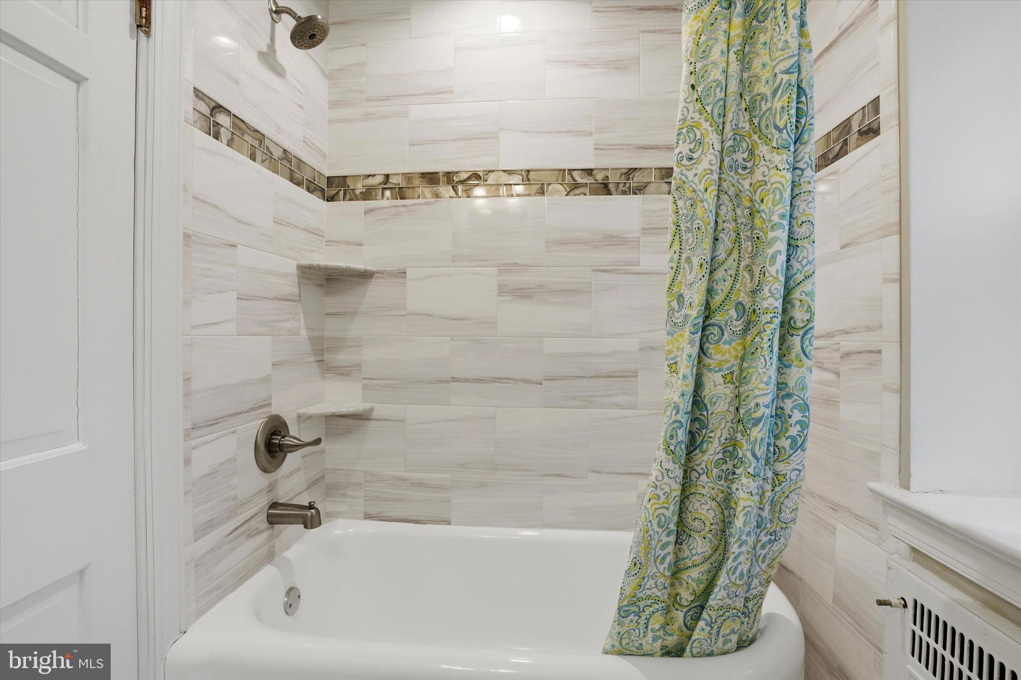 507 Murdoch Road Philadelphia, PA 19119 - Photo 27 of 52 a bathroom with a bathtub and shower