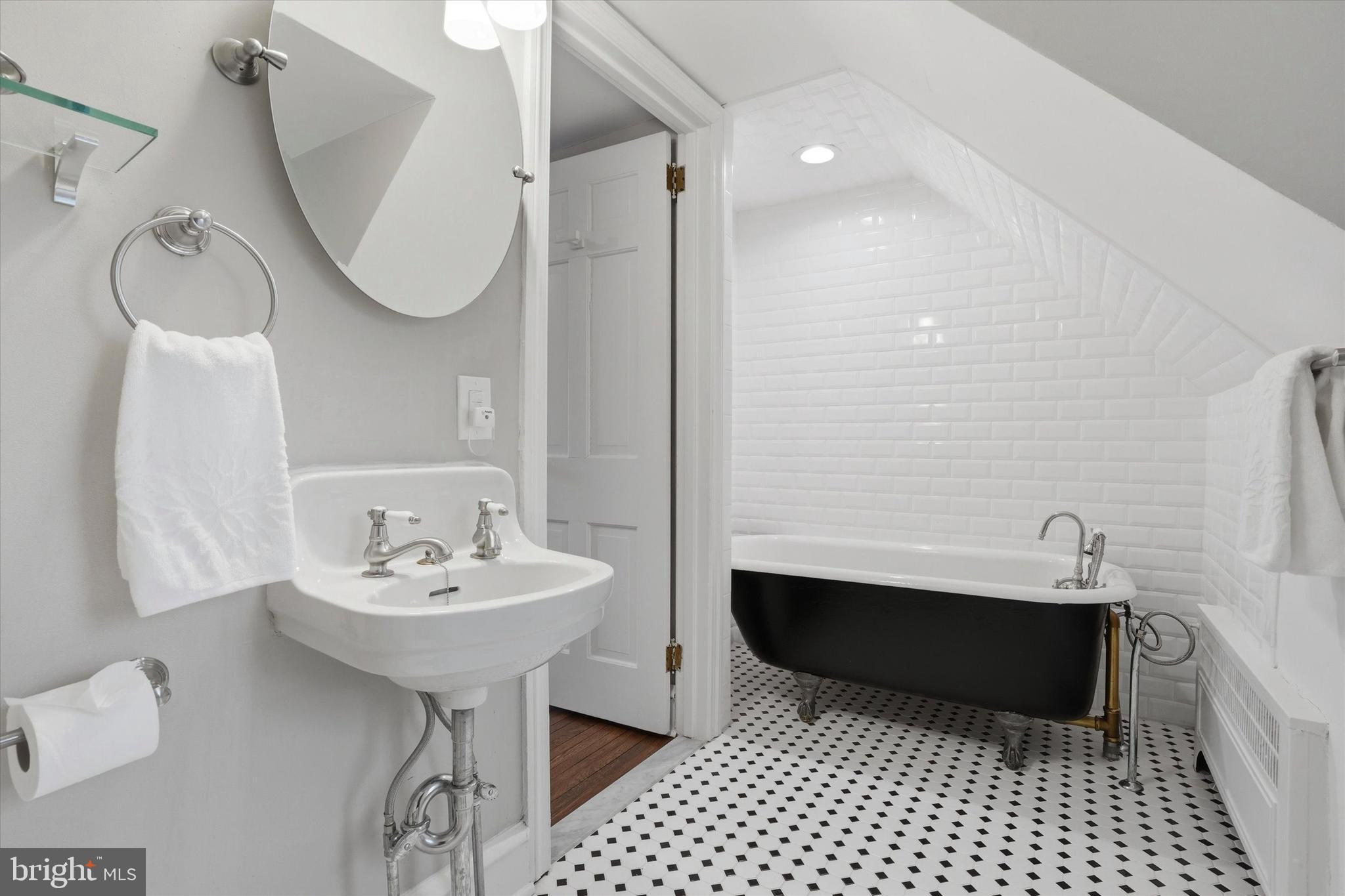 507 Murdoch Road Philadelphia, PA 19119 - Photo 32 of 52 a bathroom with a sink a toilet and a mirror