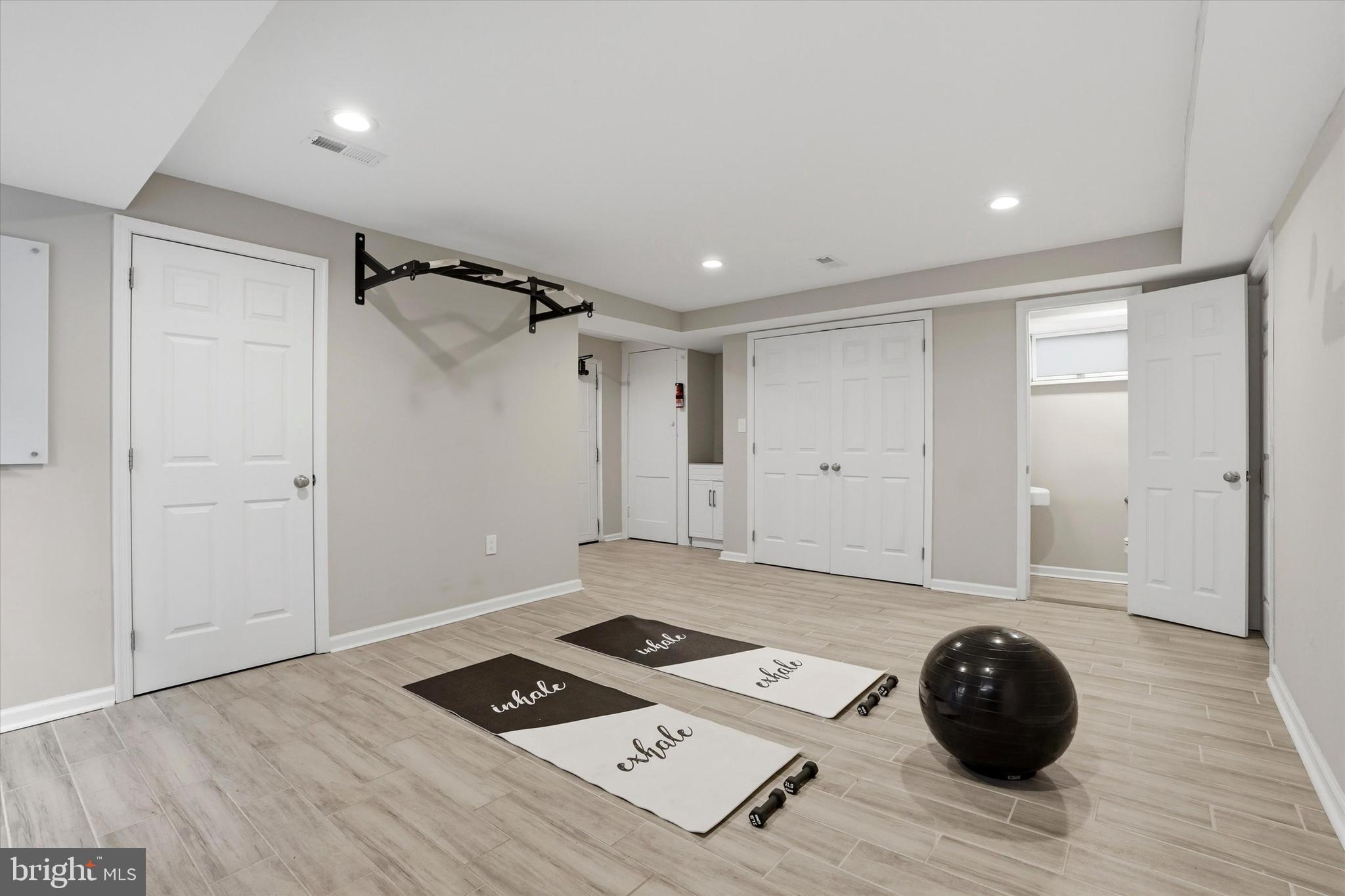 507 Murdoch Road Philadelphia, PA 19119 - Photo 33 of 52 a room with a window and wooden floor