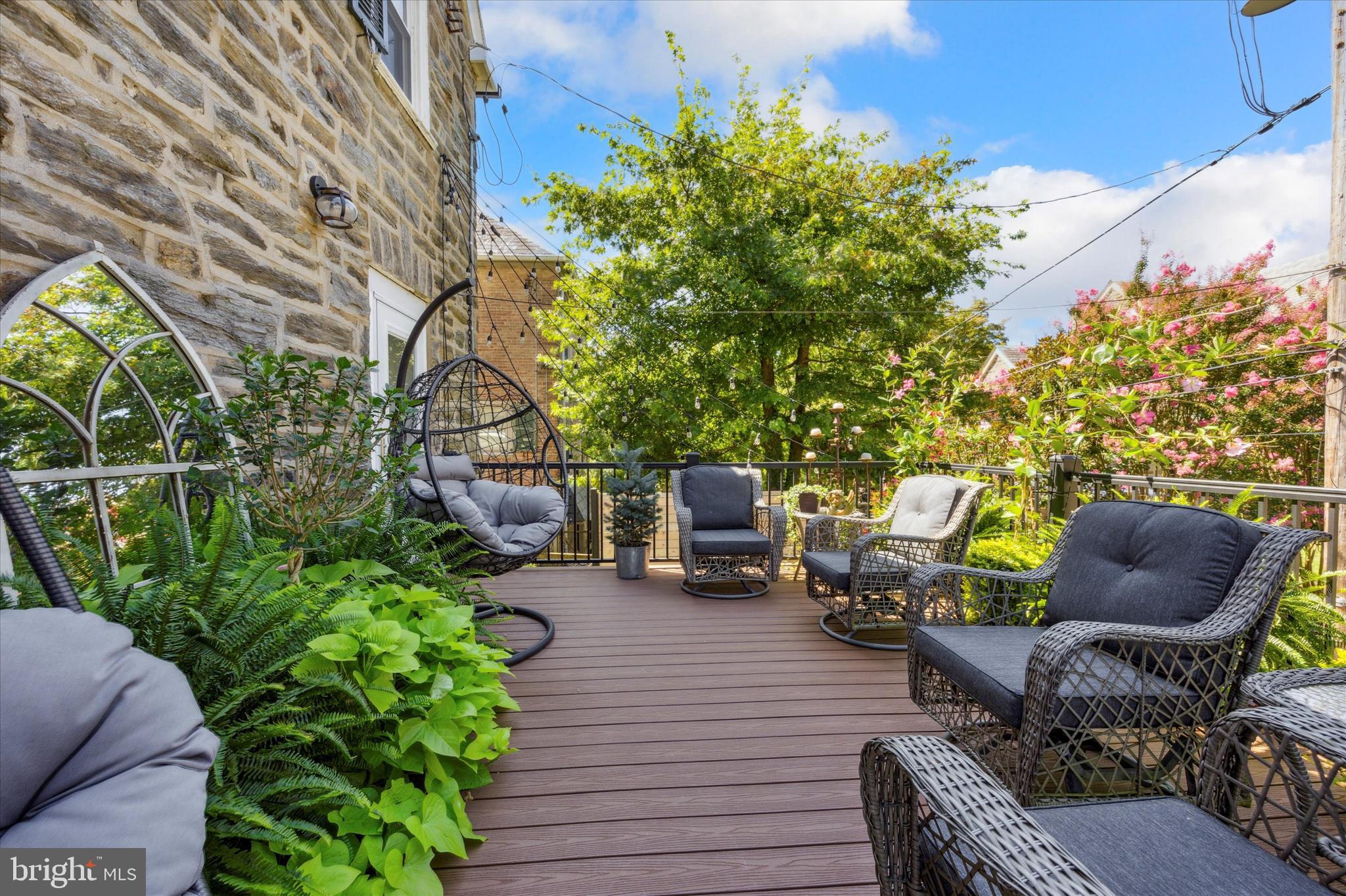 507 Murdoch Road Philadelphia, PA 19119 - Photo 38 of 52 a view of a chairs and table in the backyard