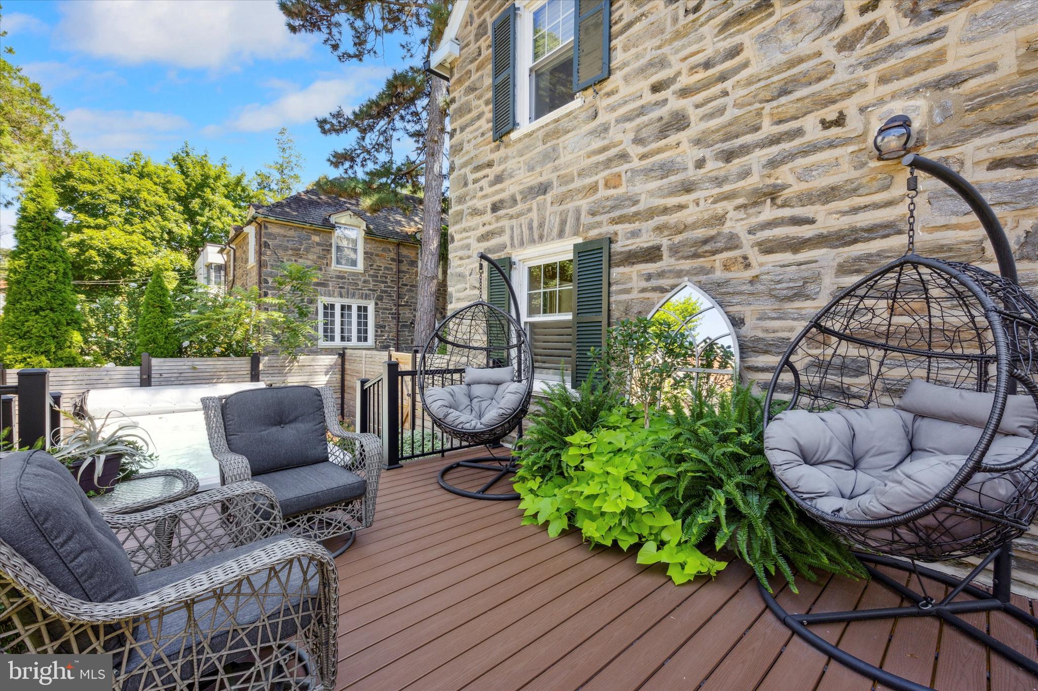 507 Murdoch Road Philadelphia, PA 19119 - Photo 40 of 52 a view of a patio with couches table and chairs and potted plants