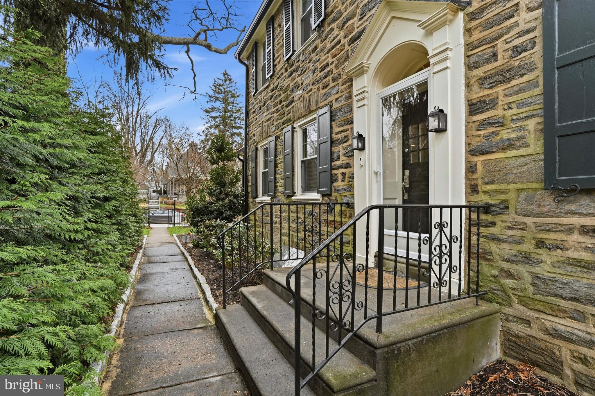507 Murdoch Road Philadelphia, PA 19119 - Photo 4 of 52 a view of a brick house with many windows