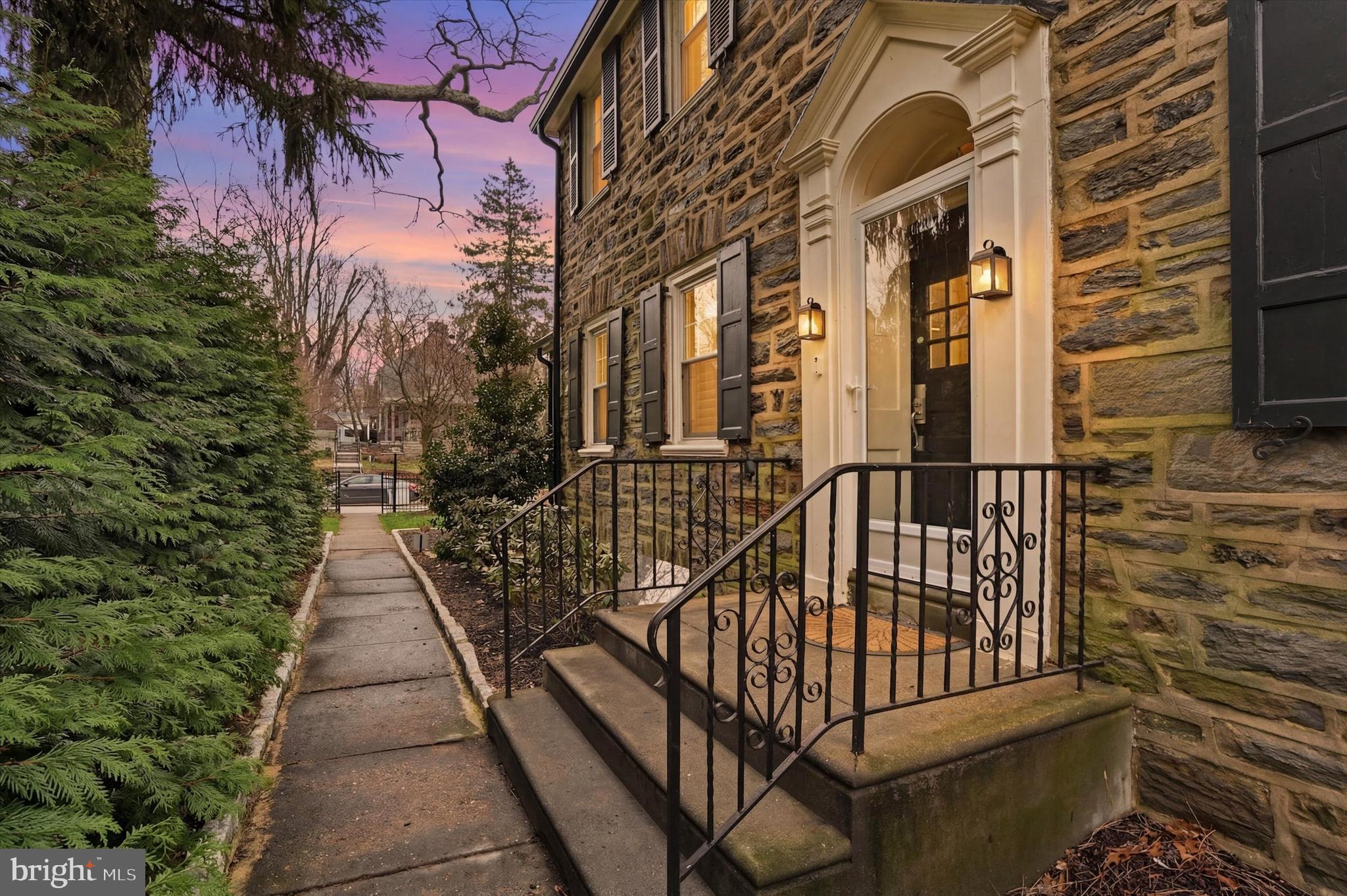 507 Murdoch Road Philadelphia, PA 19119 - Photo 5 of 52 a view of a brick house with many windows