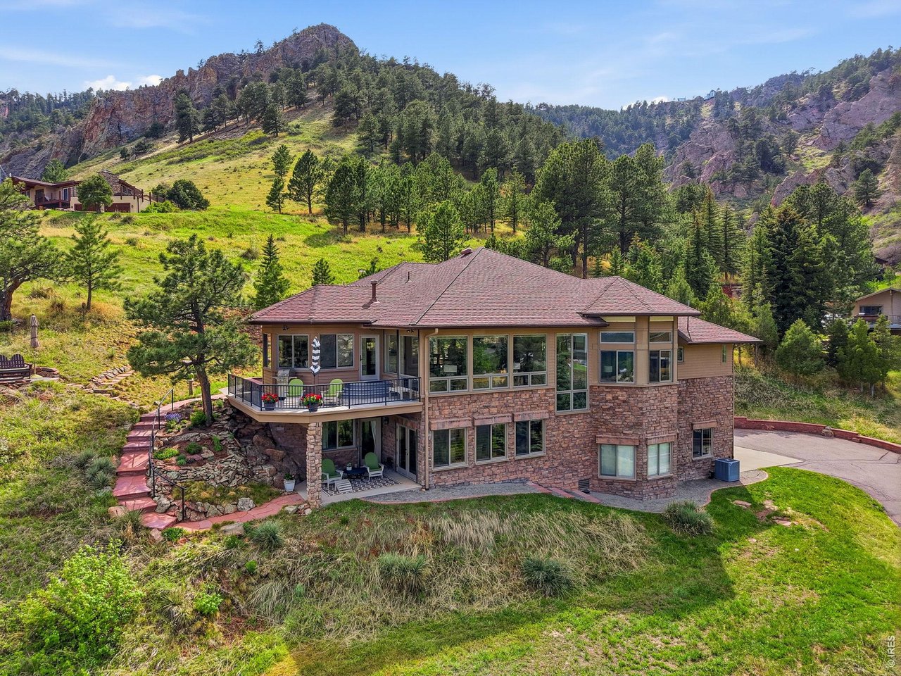 86 South Cedar Brook Road Boulder, CO 80304 - Photo 2 of 40 a view of a house with a garden