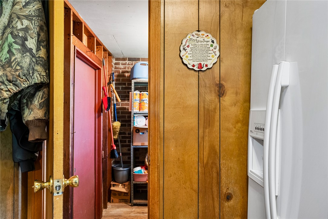 312 Edwards Drive Anderson, SC 29626 - Photo 24 of 44 Functional utility space, complete with organized shelving, offers practical storage solutions.