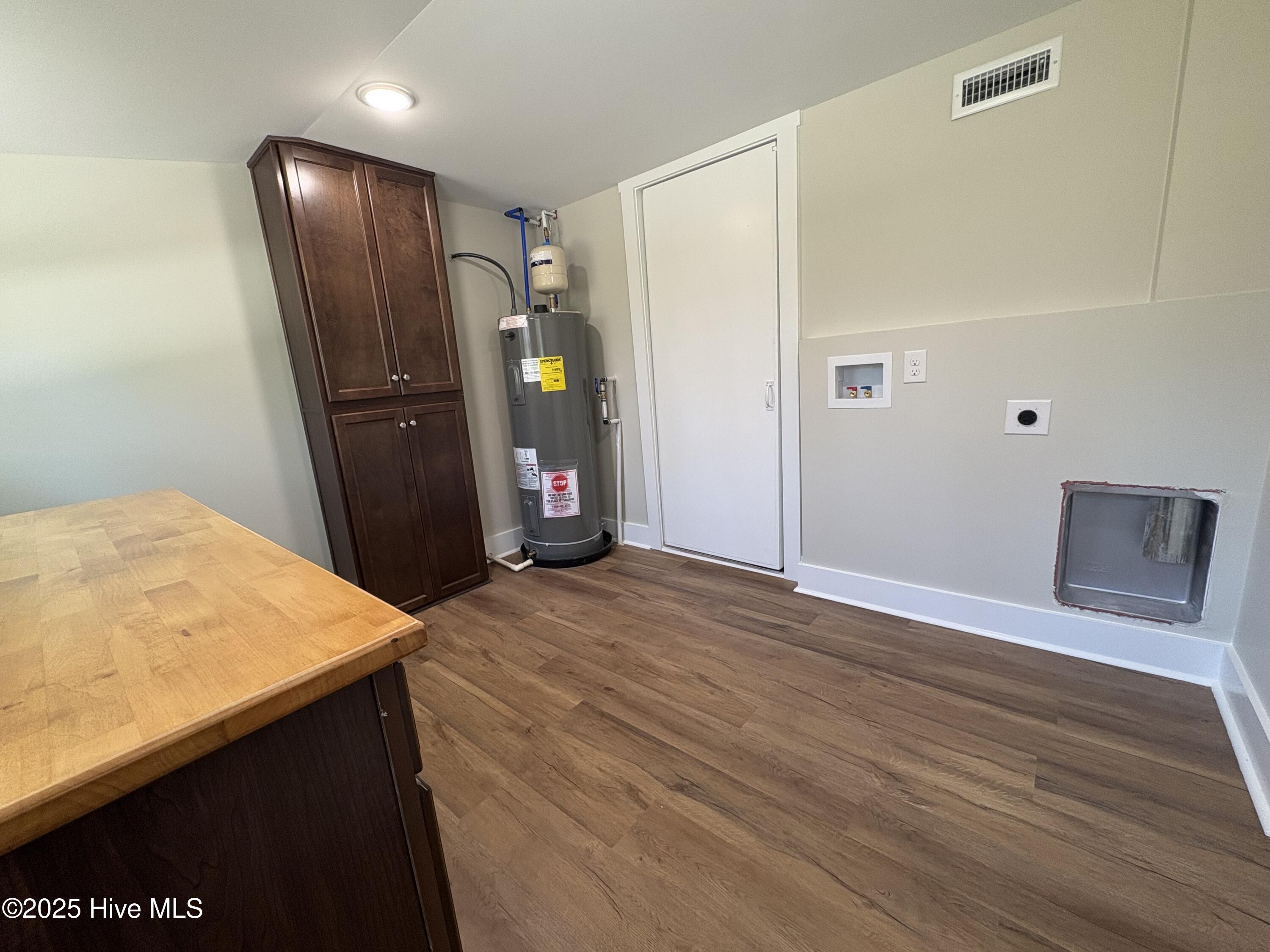 599 Bitmore Road Whiteville, NC 28472 - Photo 12 of 23 Pantry, laundry and back of hidden bookshelf door