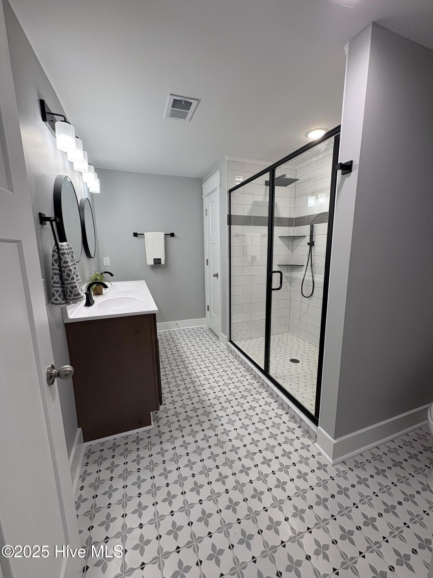 599 Bitmore Road Whiteville, NC 28472 - Photo 15 of 23 Primary Bathroom with tile floors