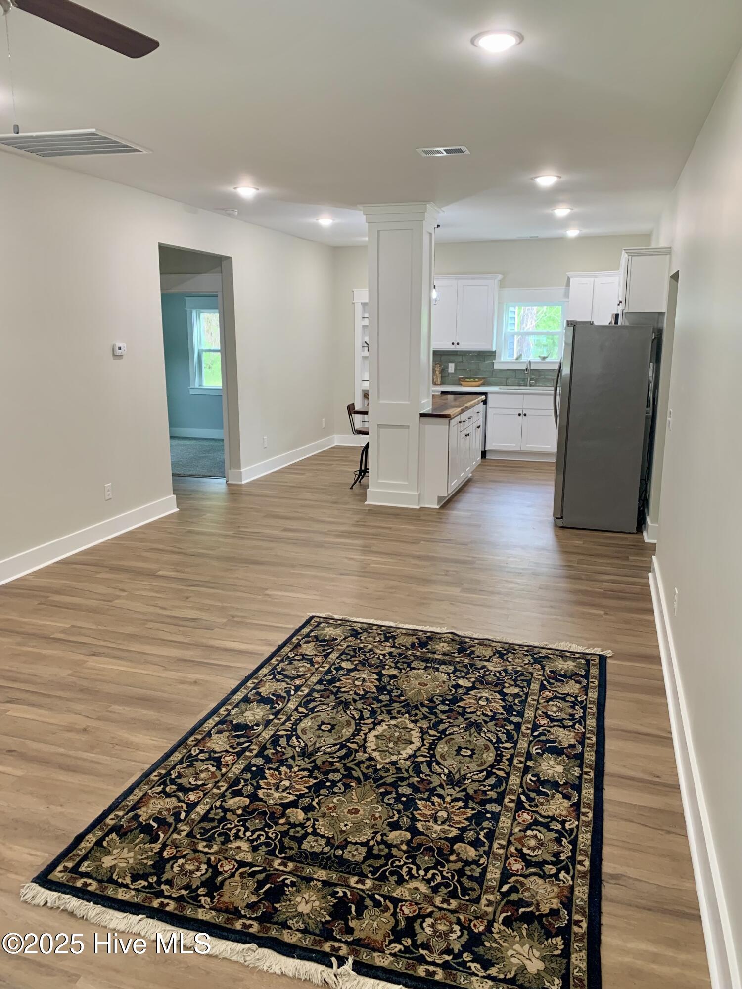599 Bitmore Road Whiteville, NC 28472 - Photo 3 of 23 Spacious open-concept living area with seamless flow into the kitchen.