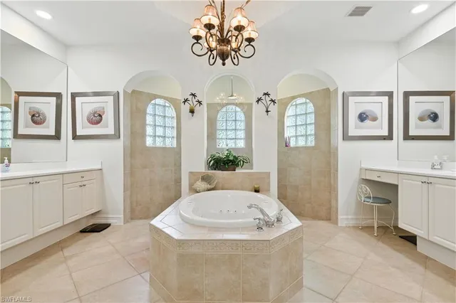a bathroom with a sink a vanity and a mirror