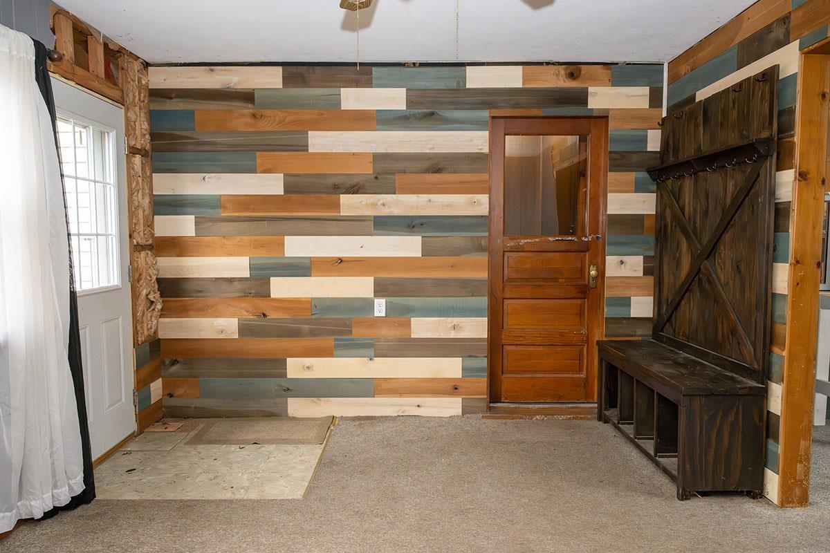503 West 2nd Street Byron, IL 61010 - Photo 34 of 56 a view of walk in closet with empty racks