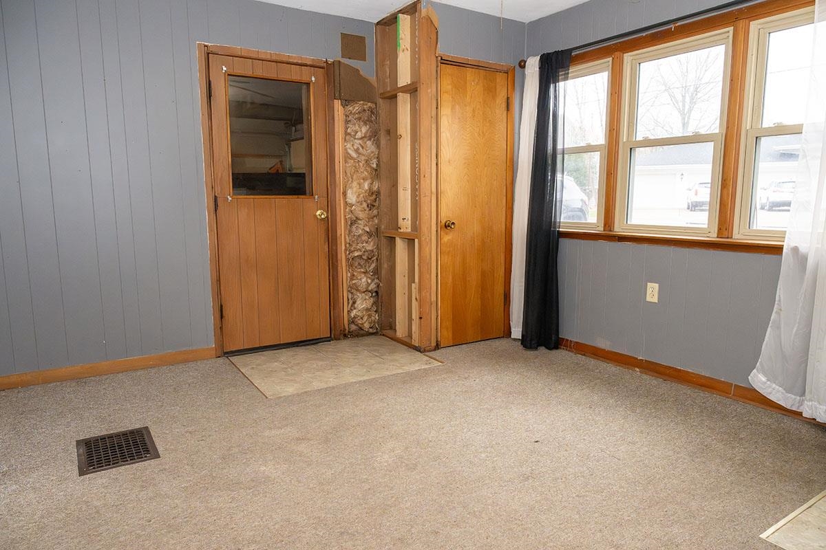 503 West 2nd Street Byron, IL 61010 - Photo 41 of 56 an empty room with windows